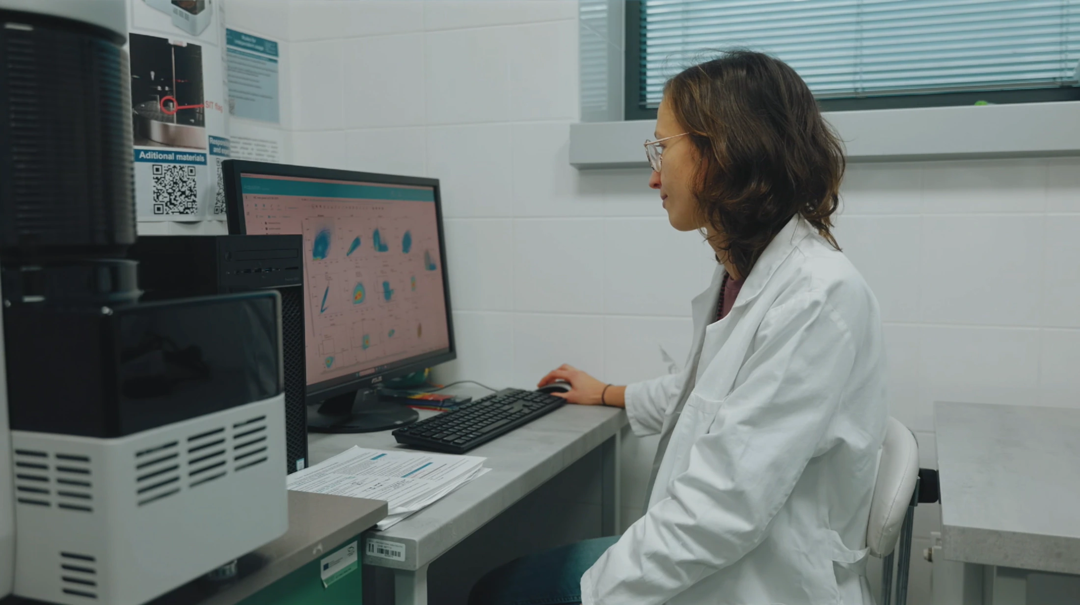 Researcher at a computer workstation